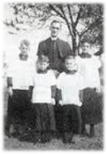 Fr Nugent with students
